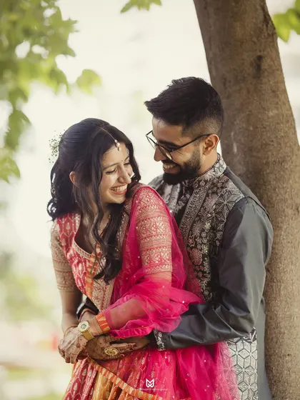Capturing genuine laughter is my specialty. This candid embrace during the Roka shoot shows the couple's comfortable and happy connection.