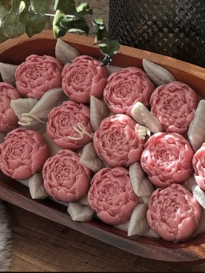 My floral garden wooden dough bowl candle, filled with beautiful pink peony wax flowers.