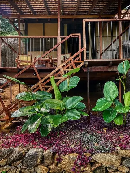The cottage's elevated position provides beautiful views and maintains a small footprint on the land.