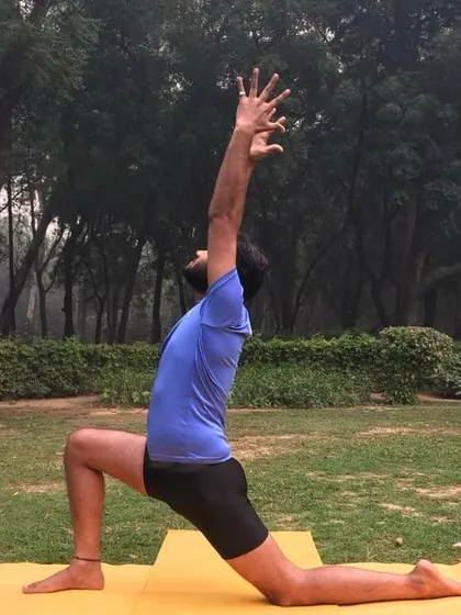 Anjaneyasana (Low Lunge) provides a deep stretch for the hip flexors and quadriceps. With arms reaching up, it becomes an uplifting pose that opens the chest and encourages a full, deep breath.