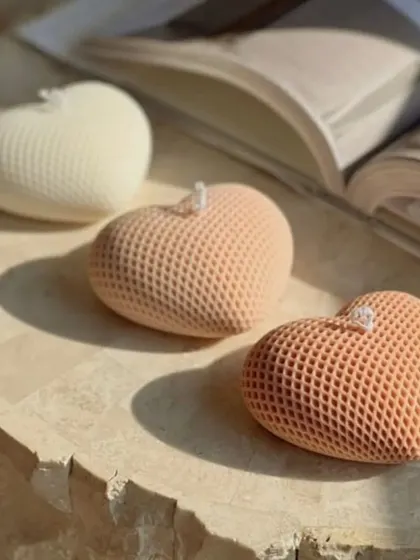Our mini heart-shaped pillar candles are a new budget-friendly addition to our catalog. They are perfect for Valentine's or as a small token of love.