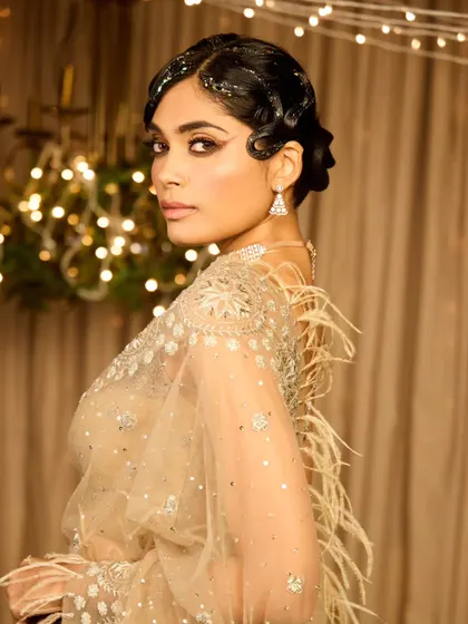 Another angle of the vintage updo, showing how it looks from the back. The glitter is concentrated at the front, keeping the back sleek and elegant.