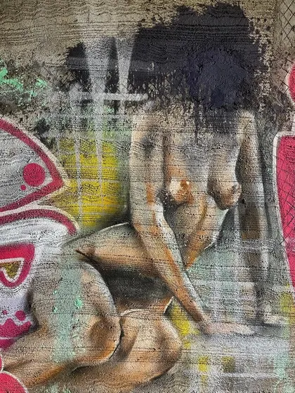 A close-up of a female figure study. It's all about capturing the curves and the anatomy with spray paint.