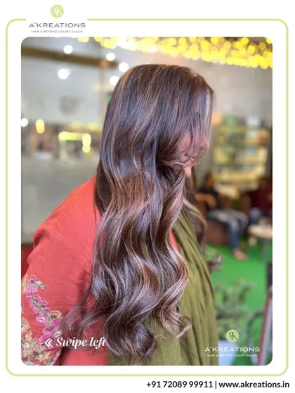 A beautiful example of our custom balayage service. We hand-painted these highlights to create a natural, sun-lit effect that blends seamlessly with the base color.