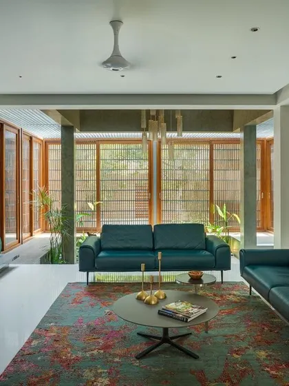 The living room at 'The Mantle', which opens up to an internal courtyard, blurring the lines between inside and out.