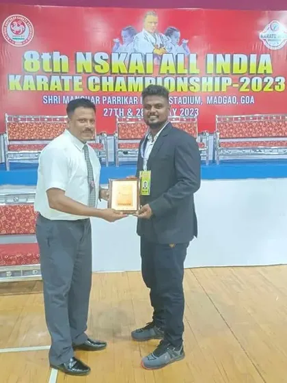 A moment of recognition for our coach at the All India Karate Championship in Goa.