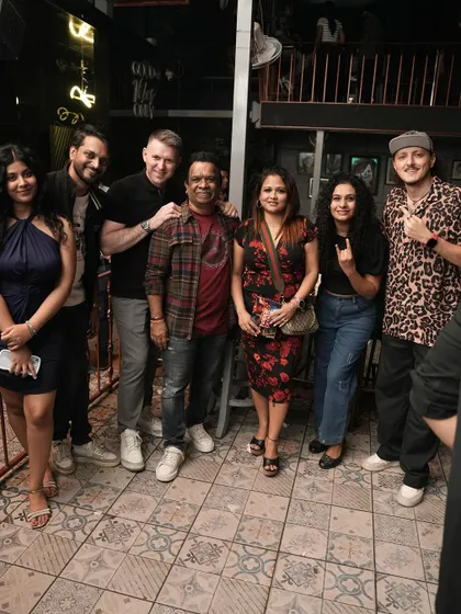 A big group of friends enjoying the night.