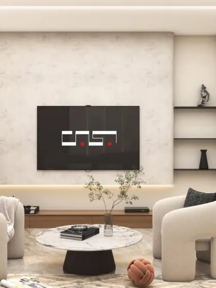 A minimalist living area featuring unique, sculptural armchairs and a low-profile media unit. The textured wall and marble flooring add a layer of subtle luxury.