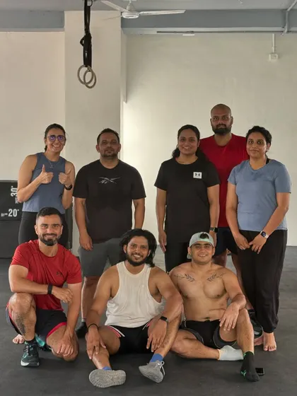 Building better humans, one day at a time. This group photo captures the positive vibes and happiness we share after a rewarding workout.