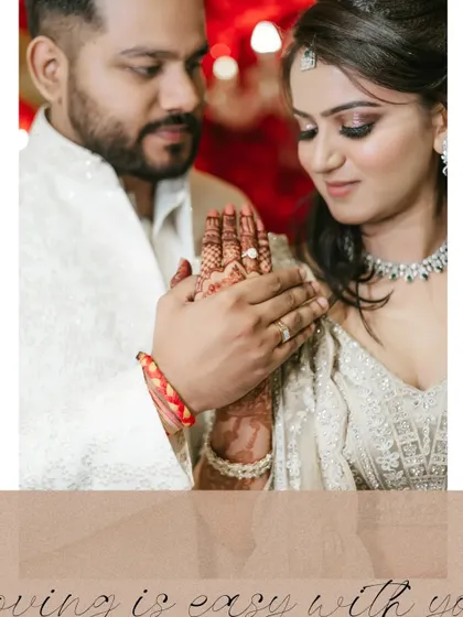 A close-up of the couple's hands during their ring ceremony, a moment symbolizing their commitment.