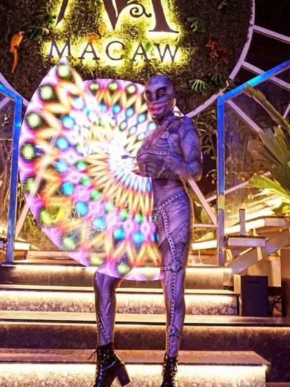 A full-length shot of my alien-like Halloween costume. The combination of the bodysuit, mask, and pixel hoop creates a truly otherworldly character.