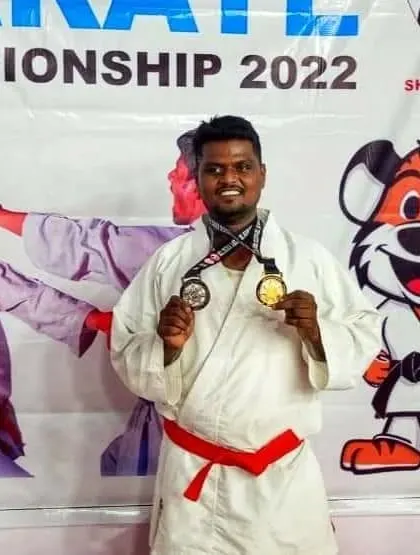 Celebrating two medals, one for Kata (forms) and one for Kumite (sparring), at the National Karate Championship in Mumbai. This shows our strength in multiple areas of karate competition.