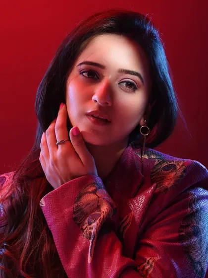 The pose and lighting in this shot are designed to create a soft yet confident mood. It's a versatile headshot that shows a different side of the actor's range.