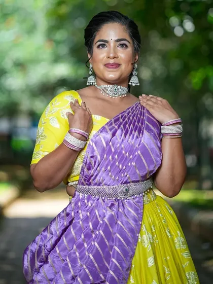 A close-up of the client's Navaratri look, showing the beautiful combination of colors and fabrics.