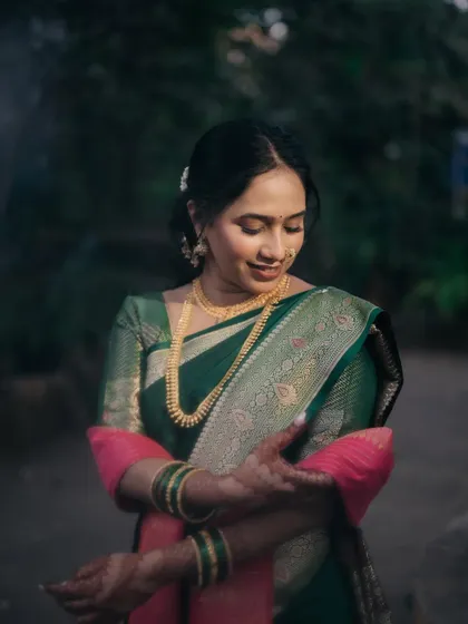 A quiet moment of reflection for the bride. The soft glam makeup enhances her features without overpowering her natural beauty.
