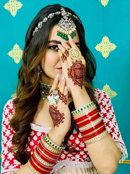 A close-up view of the modern mandala henna design. The sharp lines and symmetrical patterns create a captivating look that stands out.