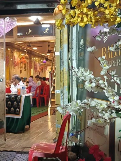A peek into our banquet hall from the entrance during a Ramadan evening. The warm lighting and decorated interior create a welcoming atmosphere for all our guests.