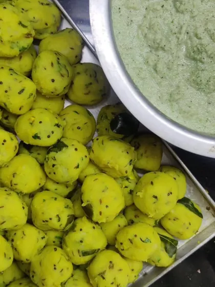 Batata Wada is pure love. Here are the potato balls, ready to be fried. How many of these can you pop, before or after frying?