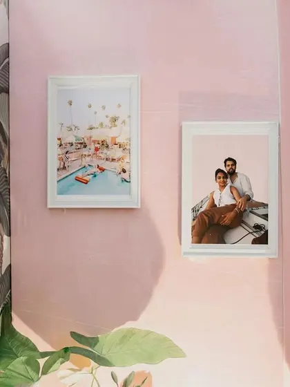 We incorporated vintage-style photos of the couple and their beloved dog, "Pebbles," into the decor. It's these personal touches that make an event truly special.