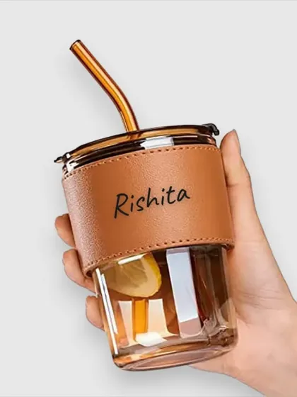 The amber-colored glass sipper is another stylish option. It comes with a matching straw and a personalized grip.