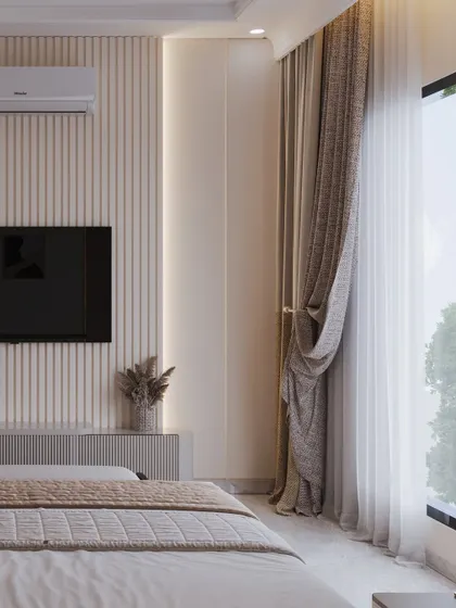 A shot of the TV wall with its vertical fluting, demonstrating a consistent use of texture throughout the space.