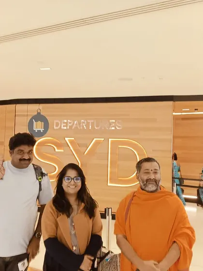Waving goodbye at the Sydney airport. I carry back many fond memories from my performances for the Kannada people in Australia.