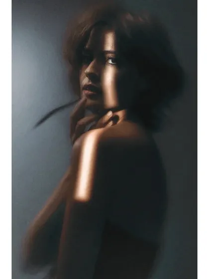 Another example of the dramatic lighting I was able to achieve with the Sigma 30mm lens. The narrow sliver of light creates a powerful, high-fashion mood.
