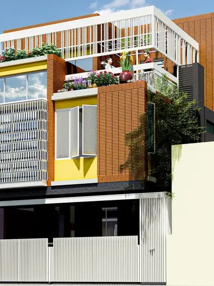 This design proposal for the 'Inba Nilayam' residence features a dynamic facade with metal jali work, terracotta cladding, and a rooftop garden, blending traditional and contemporary styles.