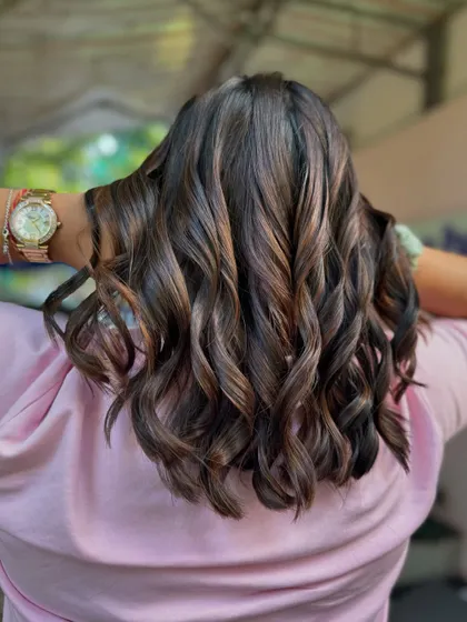 Brunette and thriving. A fresh cut and a non-bleach color give this hair so much life and movement. (No filter)