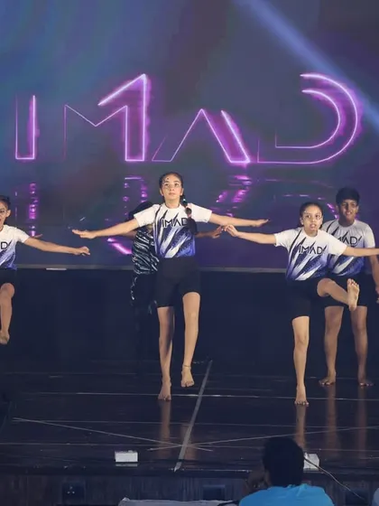 A glimpse of a gymnastics-infused dance performance from our annual show, showcasing the versatility of our students' skills.