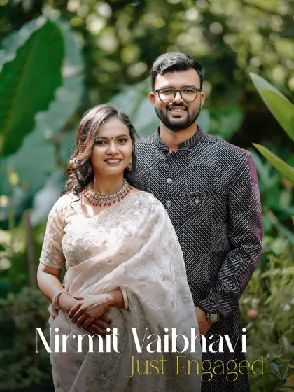 Just engaged. A classic portrait announcing the engagement of Nirmit and Vaibhavi, their happy smiles making it official.