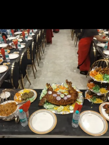 This is what a full banquet setup looks like. From the whole fried fish to the kebabs and curries, your event table will be overflowing with delicious food.