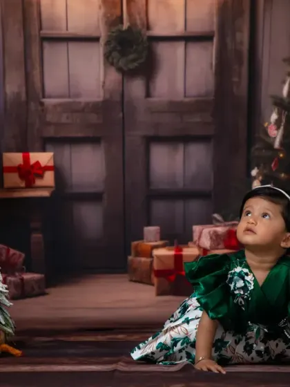 A quiet, magical moment captured during a Christmas-themed photoshoot.
