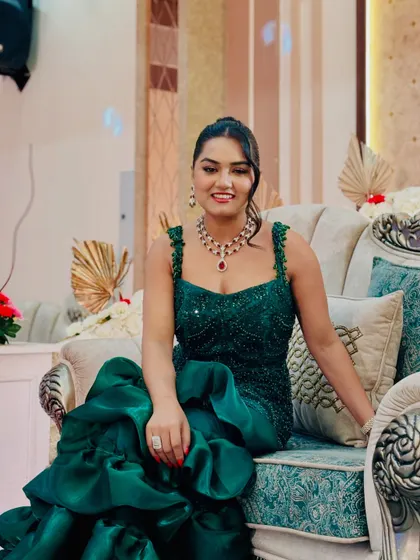 A smiling shot in the green gown. Feeling confident and comfortable in what I wear is key to my performance.