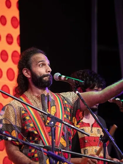 Me, leading the ensemble at Mumbai Drum Day. Performing on stage allows us to showcase the depth and complexity of the music that inspires our work.