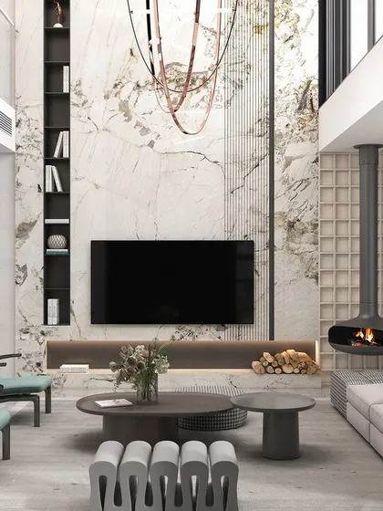 For this double-height living room, we made a statement with a suspended fireplace, creating a dramatic yet cozy focal point. The design is balanced with a striking marble accent wall, minimalist furniture, and a grand custom chandelier, showcasing our ability to handle architectural scale with elegance.