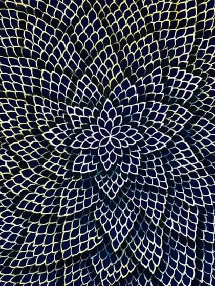 This close-up shows an intricate laser-cut or carved panel with a floral, mandala-like pattern. This level of detail adds a delicate, almost lace-like texture to a surface, playing with light and shadow to create a sense of depth and artistry.