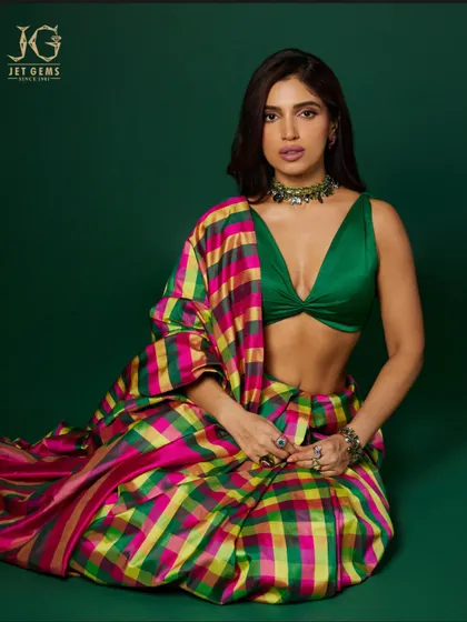 Beauty captured in technicolour. Bhumi Pednekar looks absolutely stunning in our kaleidoscopic rings and emerald choker, a bold and vibrant statement.
