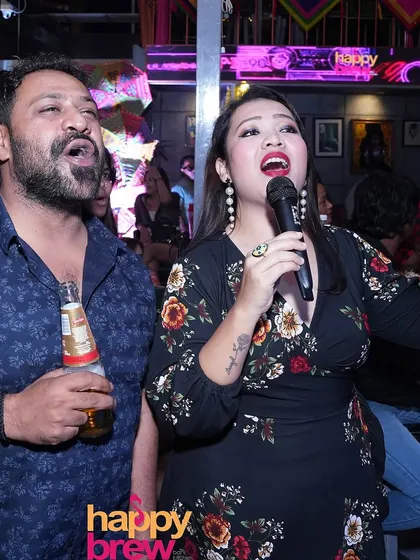 It's all about moments like this. Two people, lost in the song, giving it their all. My karaoke nights are a judgment-free zone for both bathroom singers and stage pros.