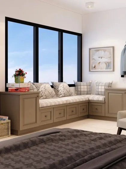 This bedroom features a beautiful bay window seat with built-in drawers for extra storage. It's the perfect place to enjoy the view and a quiet moment.
