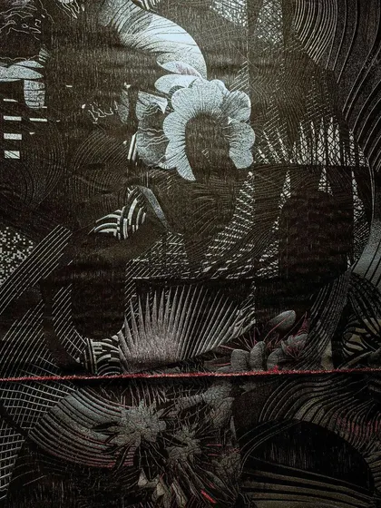 A close-up of the intricate weaving in the 'Gothilicious' panels. The detail reveals the complexity of the pattern, which combines floral motifs with abstract, graphic lines.