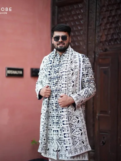 Make a statement at your Sangeet or cocktail party with a modern Indo-western outfit. This black and white embroidered jacket is a perfect example of how I blend traditional craft with contemporary style.