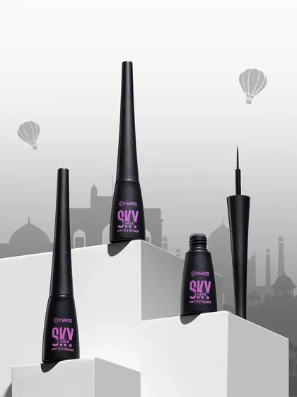 A conceptual shot for Mars Cosmetics' "Skyliner" eyeliner. We placed the products on geometric blocks against a graphic silhouette of a city skyline, creating a modern and edgy visual that plays on the product's name.