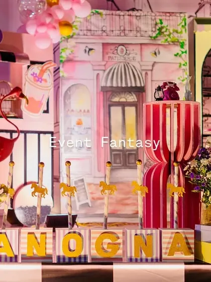Another view of the Parisian stage, showing the checkered floor and custom name blocks.
