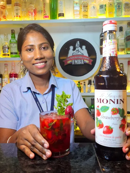 A vibrant red strawberry mocktail, proving that non-alcoholic drinks can be just as special.