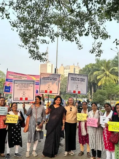 A group of enthusiastic women volunteers raising their voices and placards during our campaign walk. Their participation is a powerful statement on the importance of women's role in the democratic process.
