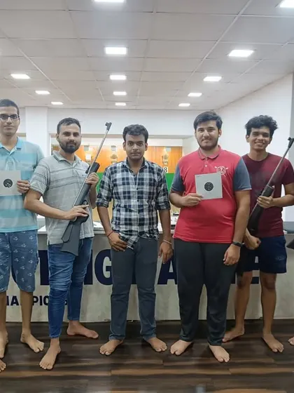The smiles say it all. It's always a good time when you bring your friends to the range to learn a new skill together.