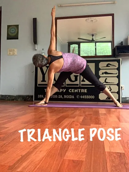 The Triangle Pose is a staple in my classes. It helps to open the hips and chest, creating more space for you to breathe deeply.