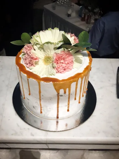 This chocolate cake is filled with salted caramel and has a very light coating of frosting, as the birthday girl is not a fan of too much sweetness. I'm always happy to customize cakes to suit your tastes, so just let me know your preferences.