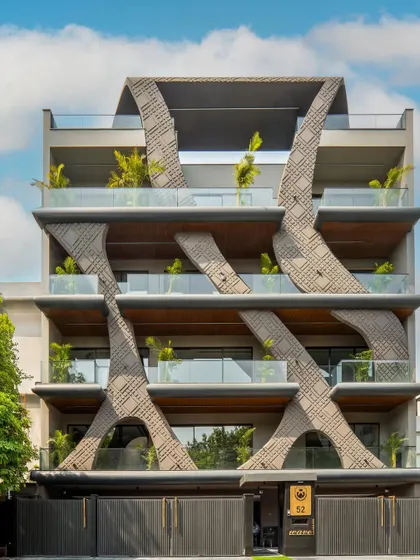 Inspired by the fluidity of natural wave forms, this residential facade in Gurgaon showcases my passion for sculptural architecture. The design uses concrete grooving and a stone finish to create a dynamic, organic structure that is both a home and a piece of art.
